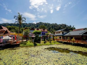 A small lake with shops lining it at the Oriental Village, Langkawi 