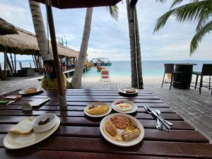 Meal by Rawa Island's beach